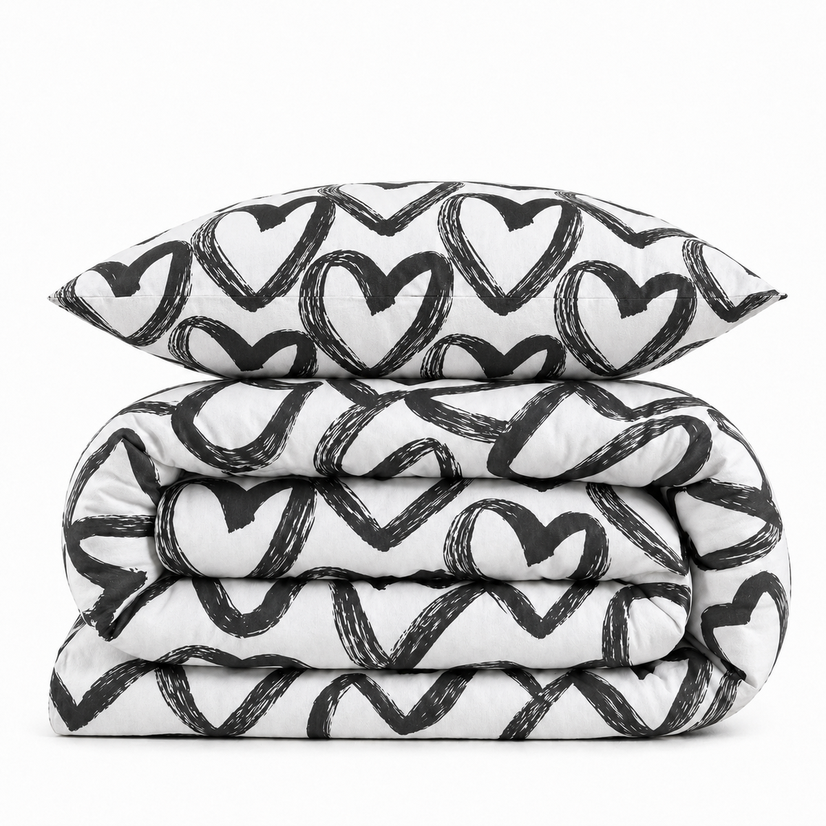 Housse de couette blanche à cœurs noirs peints pliée, avec taie d'oreiller assortie