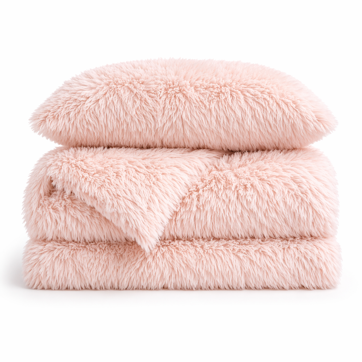 Housse de couette effet fourrure rose pâle à poils longs pliée, avec taie d'oreiller assortie