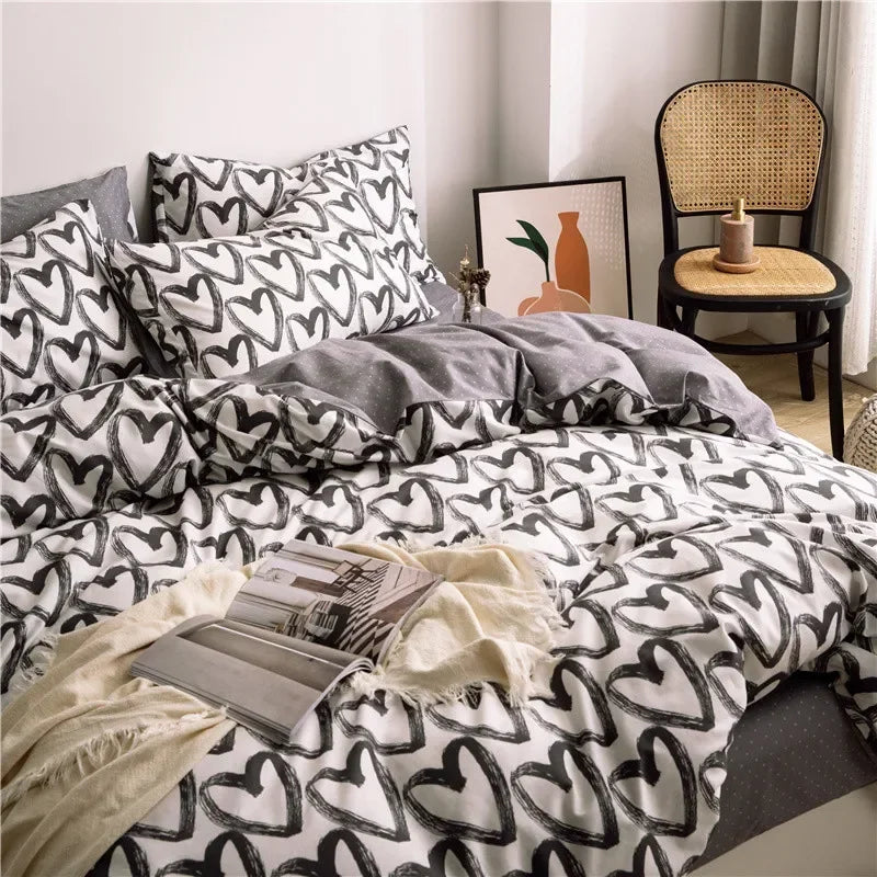 housse de couette fille motif cœur 220x240 sur un lit, autre angle