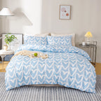 housse de couette fille motif cœur bleu sur un lit