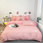 housse de couette fille damier coloré sur un lit